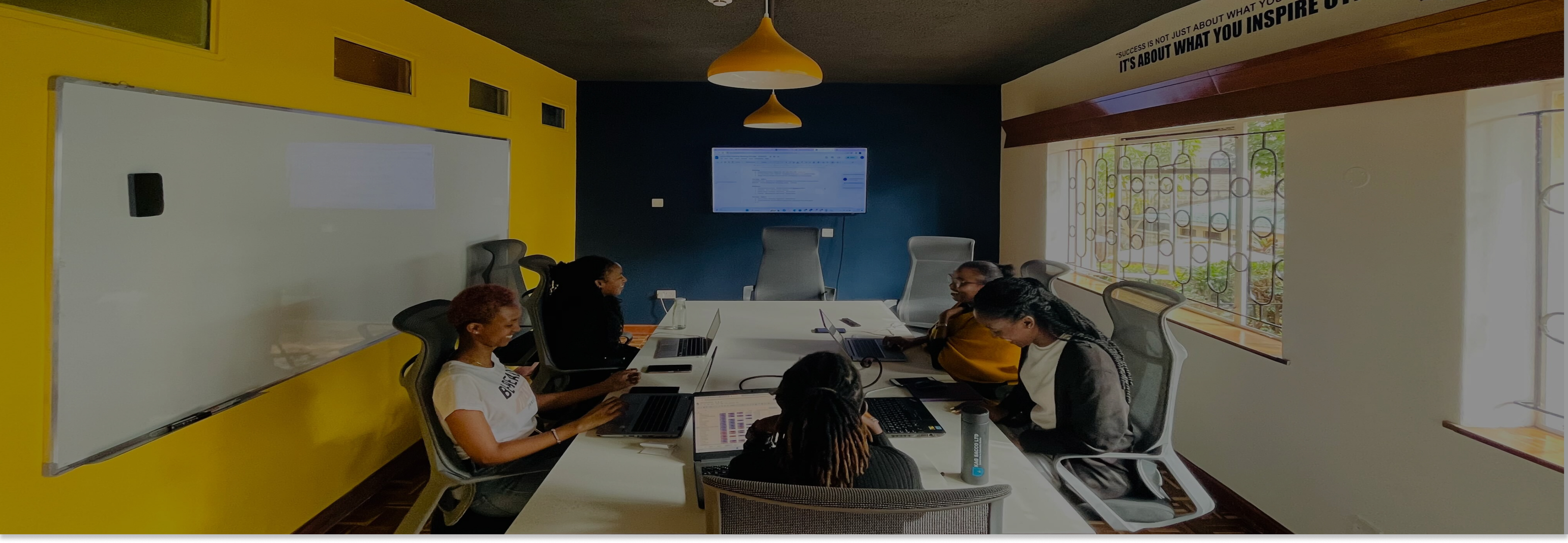 Coworking space with people working at a table
